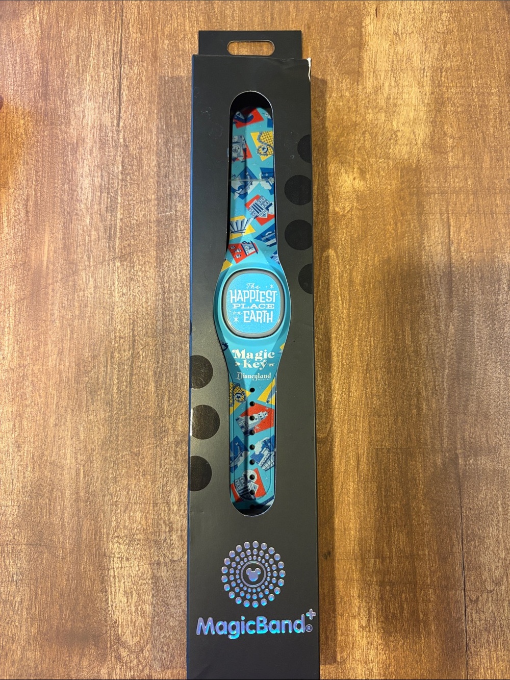 Disney MagicBand+ Teal and Multicolor Happiest Place On Earth Design